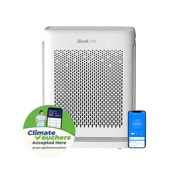 White pet air purifier with Climate Vouchers Accepted Here label and phone screens